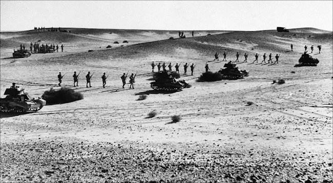 British Vickers MkIIb and Mark VI tanks and motorised infantry